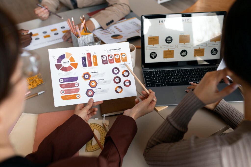 high angle people working with laptop